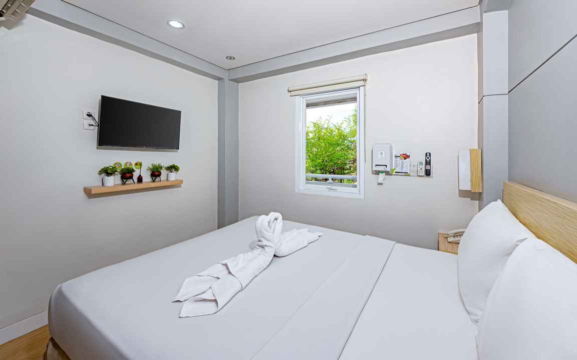 Kamar Deluxe Double di IXO Hotel Bekasi